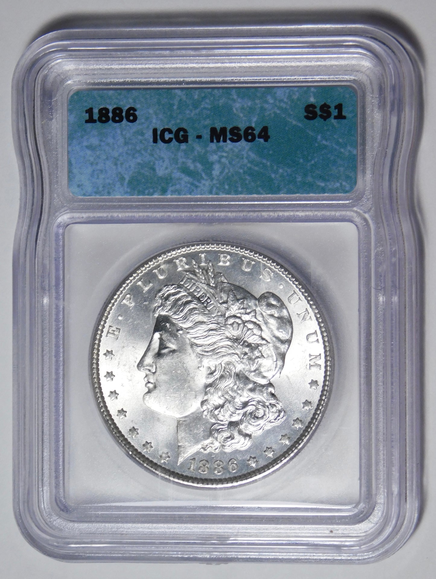 1886 Morgan Silver Dollar ICG Mint State 64